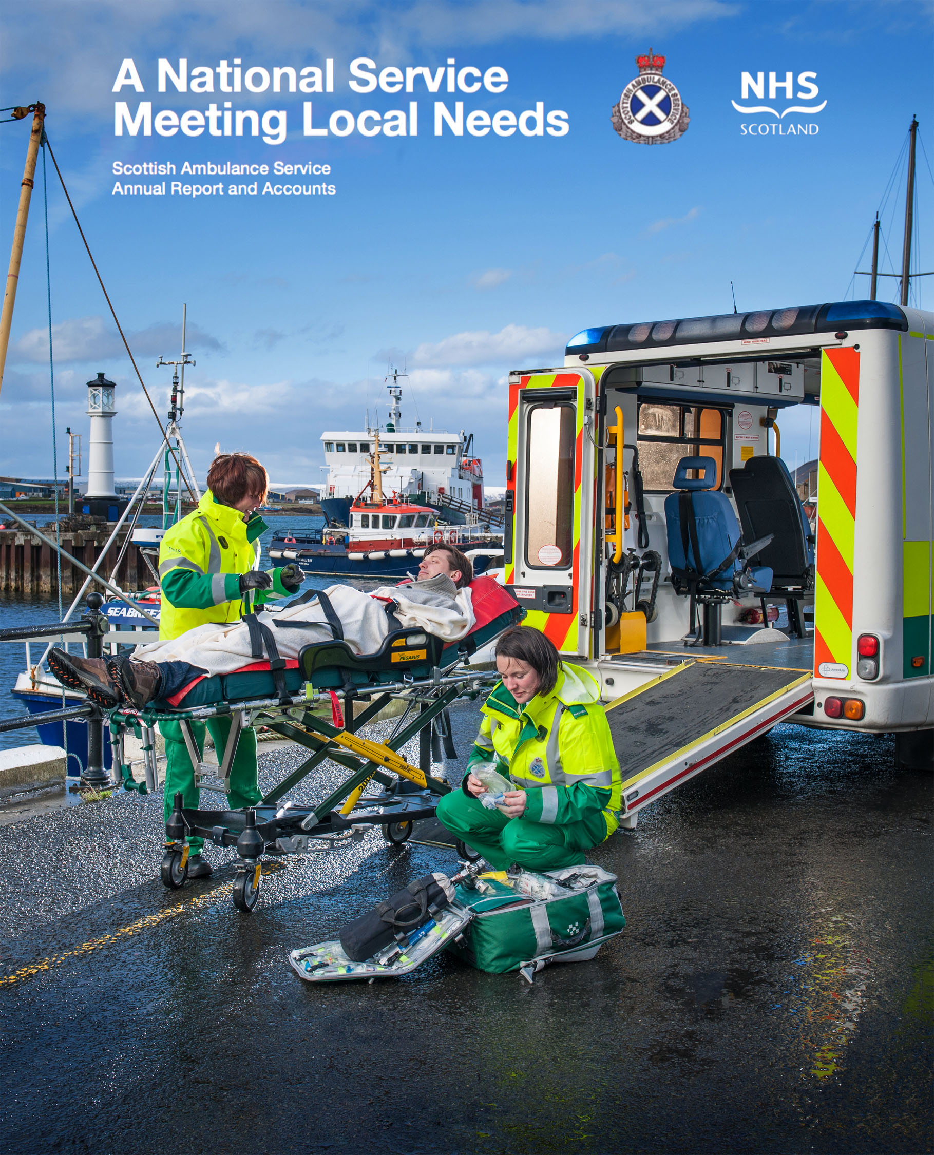 Man in stretcher being given treatment by ambulance crew on Orkney Scot;and