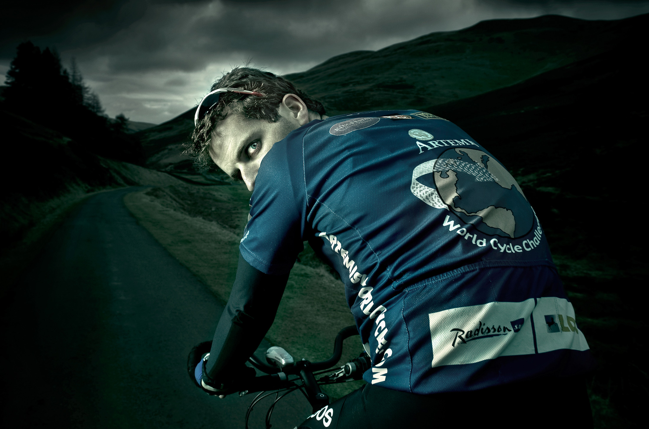 Portrait of Mark Beaumont on his bike